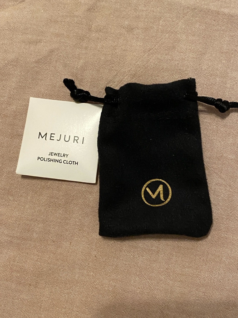 Mejuri jewelry bag + polish cloth